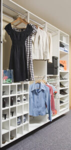 closet with cubbies, shelves and racks