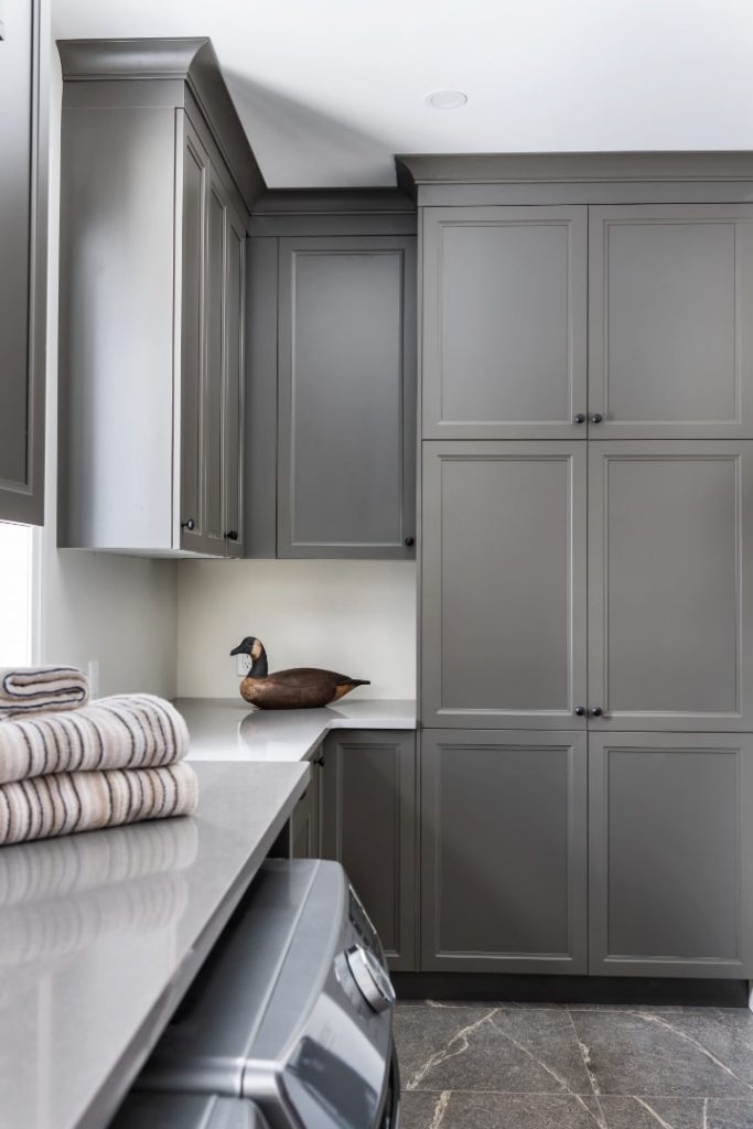Polyester cabinetry in the Green Bay Laundry Room stands up to everyday wear.